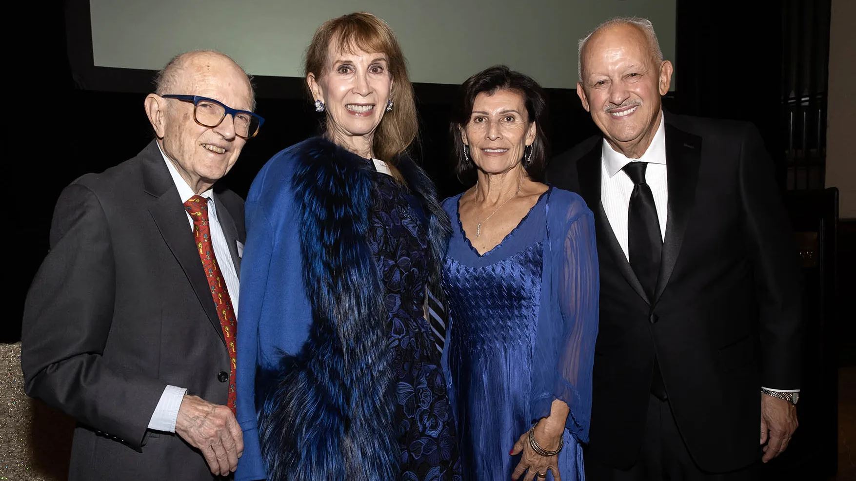 From left, W. Benson Harer, Adina Lei Savin, Evie Morales and President Tomás D. Morales.